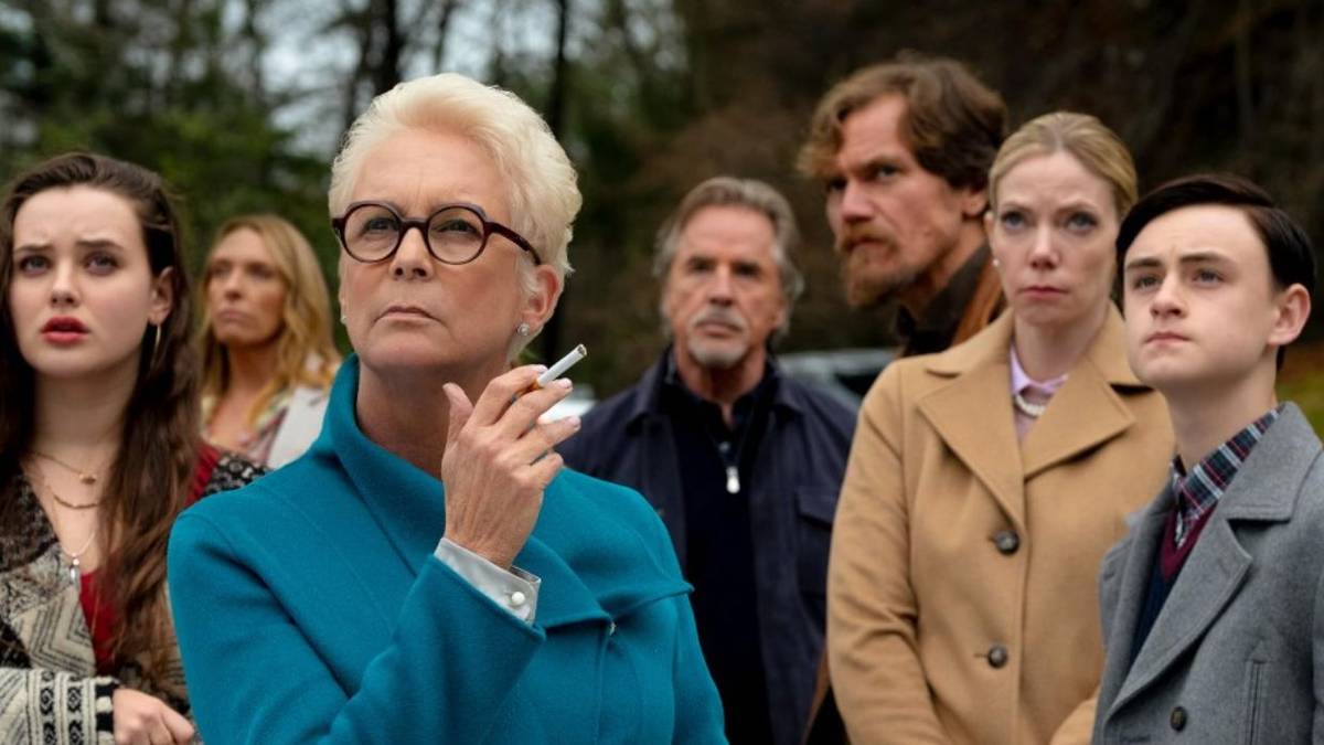 The cast gather outside and look up in Knives Out. 