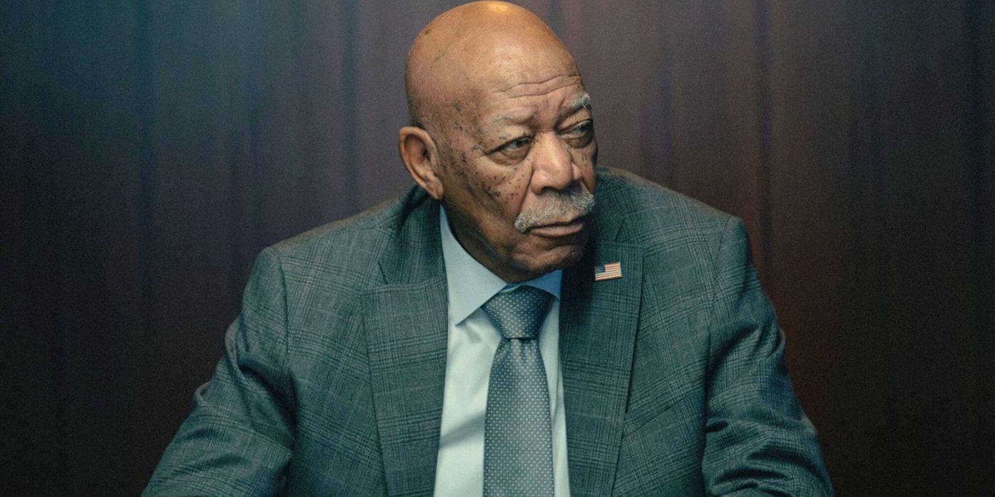 Morgan Freeman listening while wearing a suit in Lioness