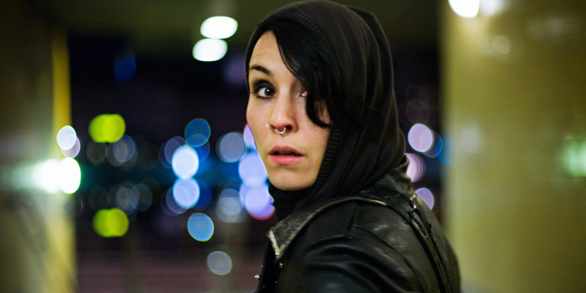 Lisbeth Salander looks back worried in The Girl With The Dragon Tattoo