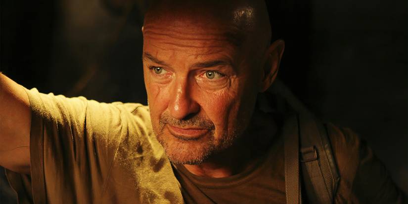 John Locke peering in the dark in Lost.
