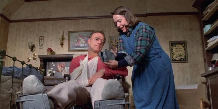 Kathy Bates tends to a wheelchair-bound James Caan in 'Misery'.