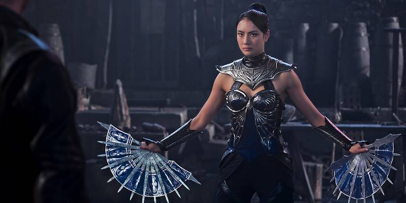 Adeline Rudolph as Kitana holds her knived hand fans in Mortal Kombat 2