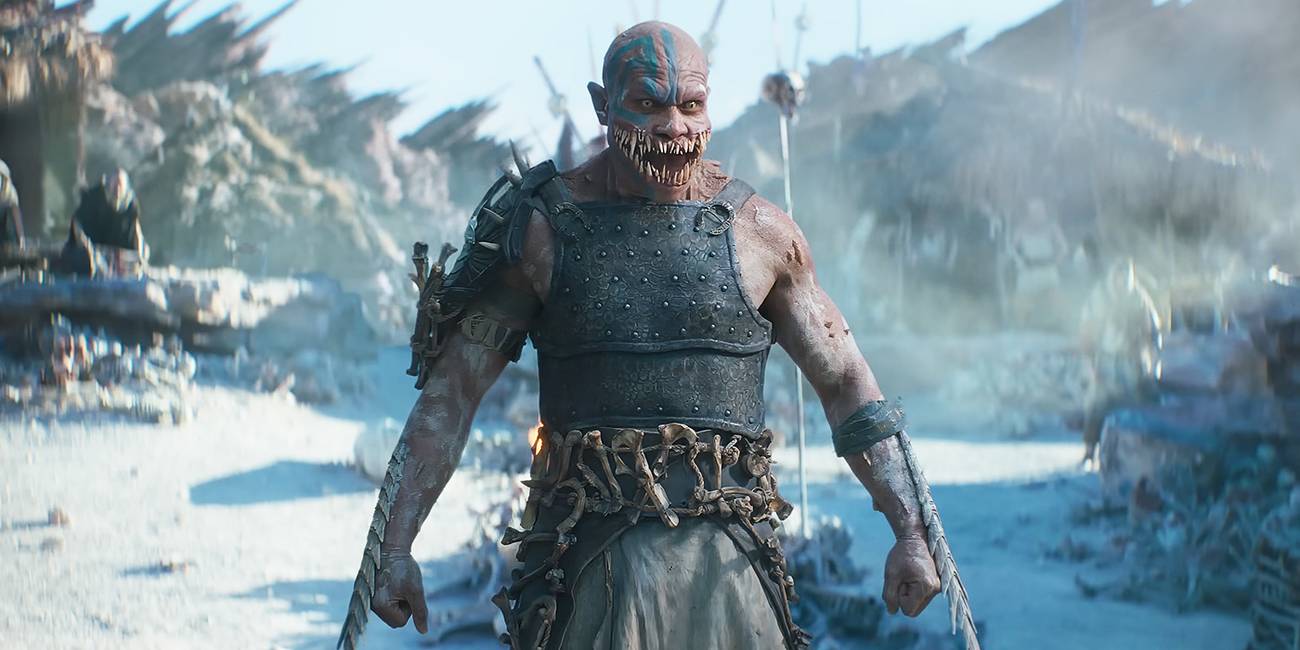 CJ Bloomfield as Baraka with his arm weapons extended on a battlefield  in Mortal Kombat 2 (Mortal Kombat II)