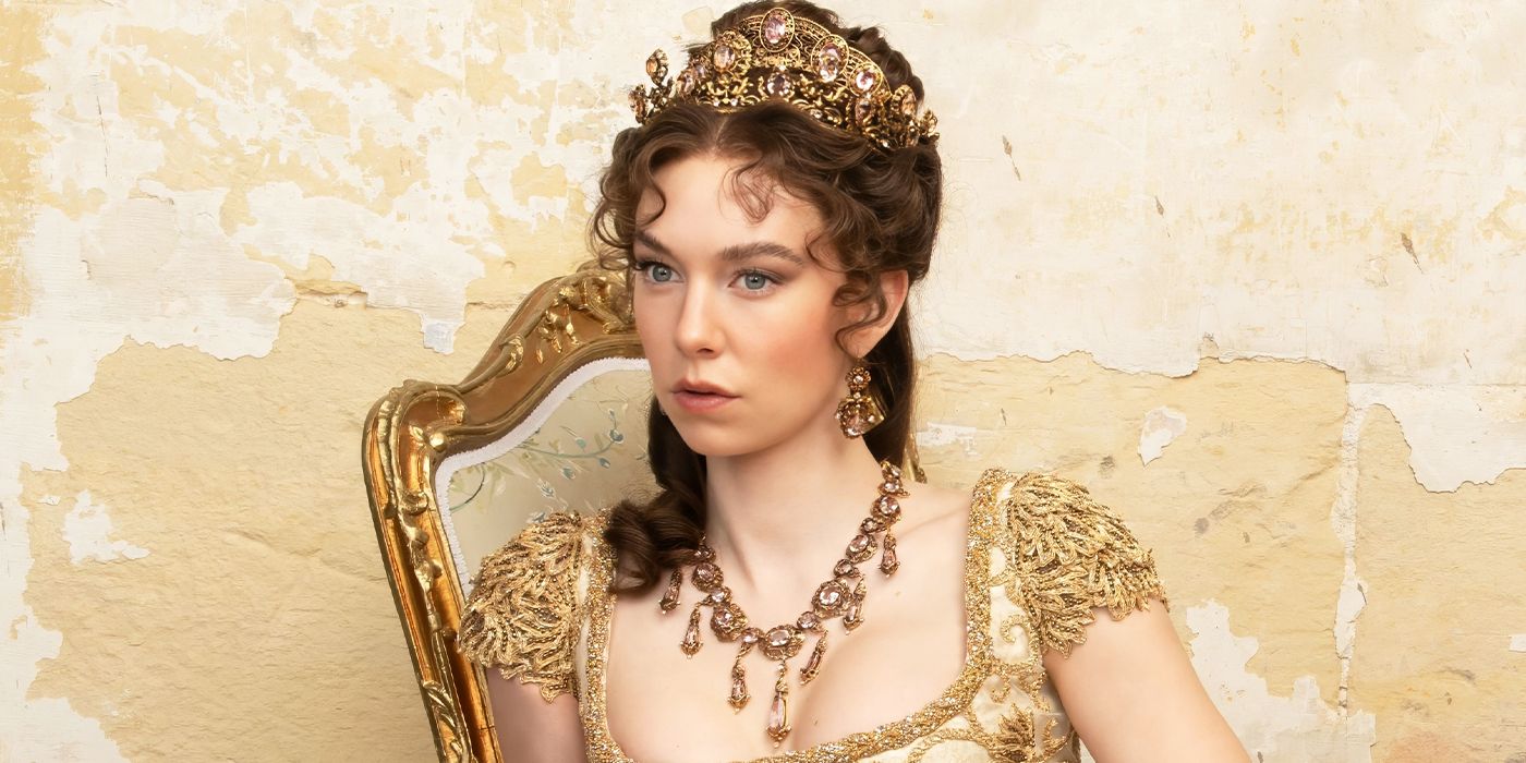 Vanessa Kirby as Josephine Bonaparte lounging in a chair in royal attire in Napoleon