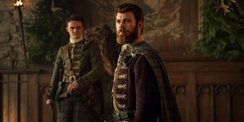 Seamus McLean Ross and Sam Retford in a fancy room in Outlander: Blood of My Blood Episode 3.