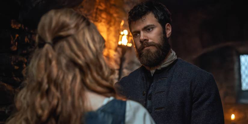 Sam Retford talking to someone in Outlander: Blood of My Blood Episode 4.