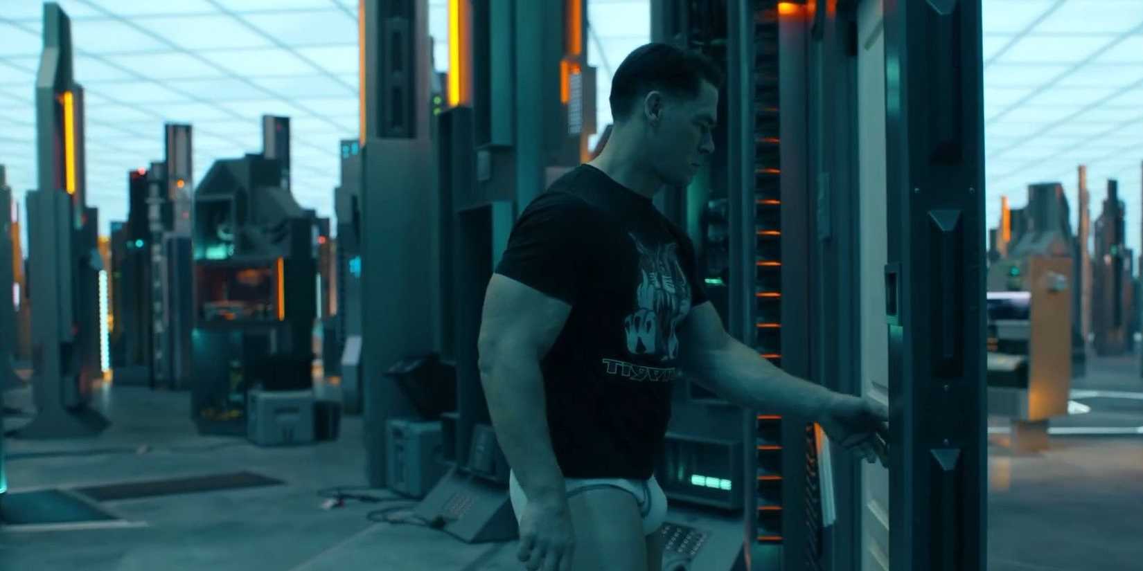 Chris (John Cena) opens a door in Peacemaker Season 2