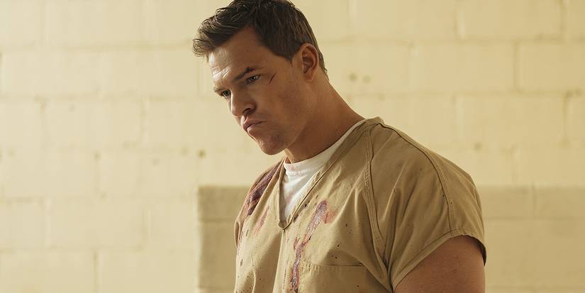 Alan Ritchson's Reacher looking upset in Reacher