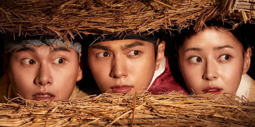 Kim Myung-soo, Kwon Nara, and Lee Yi-kyung on the poster for Royal Secret Agent, looking through some hay