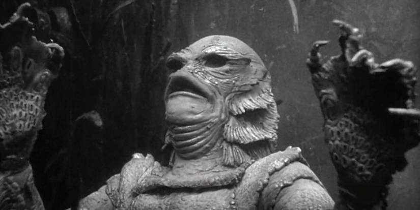 The Gill-man looks up at the surface from under the water in Creature from the Black Lagoon.