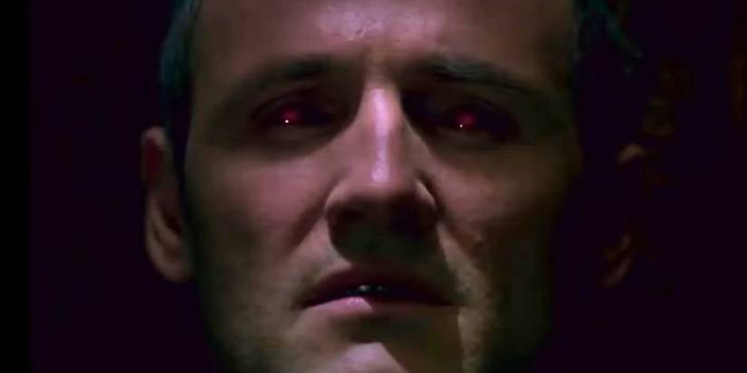 Colm Feore as Andre Linoge with glowing red eyes in Storm of the Century.