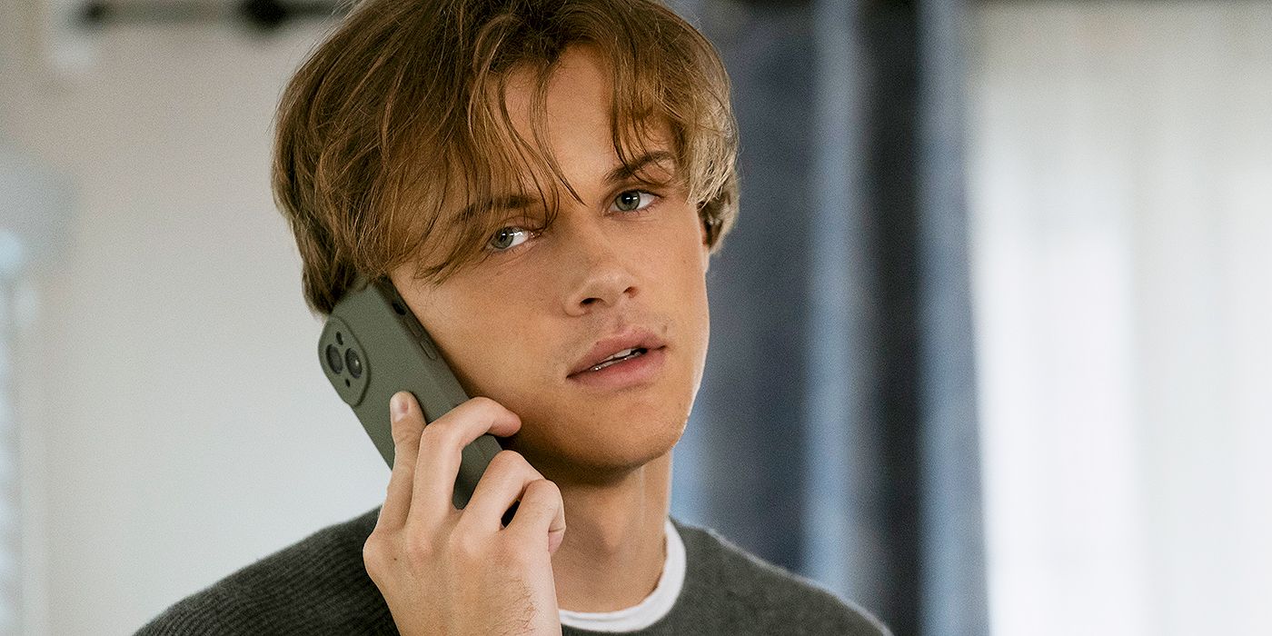 Christopher Briney as Conrad on the phone in The Summer I Turned Pretty Season 3