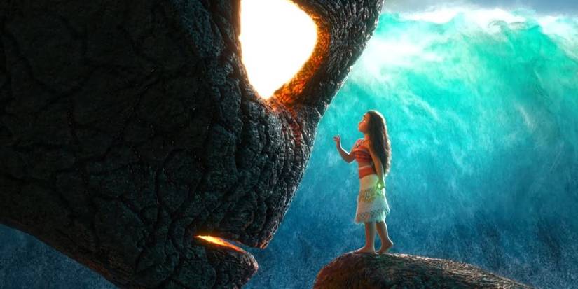 Moana stands face to face with the lava monster Te Ka in Moana.