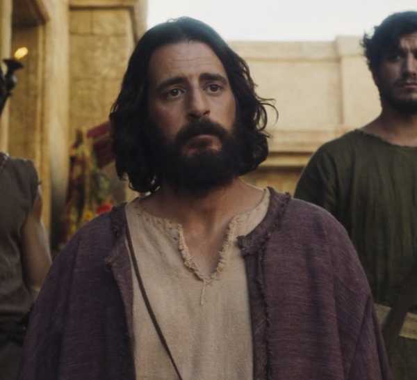 Jonathan Roumie as Jesus stands with others and looks ahead in The Perfect Opportunity episode The Chosen.
