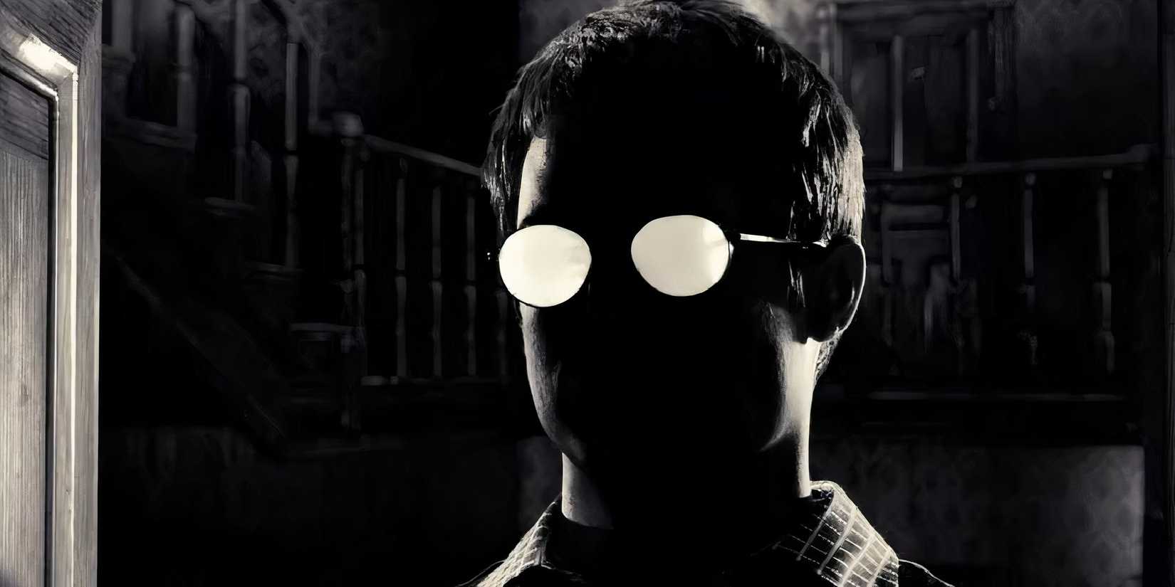 The shadow of a man wearing glasses in Sin City