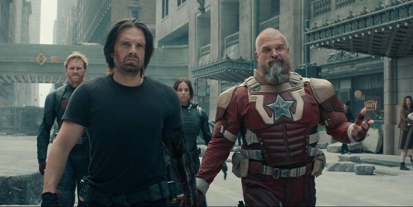 Wyatt Russell, David Harbour, Sebastian Stan, and Hannah John-Kamen walking down a street in their uniforms in Thunderbolts*.