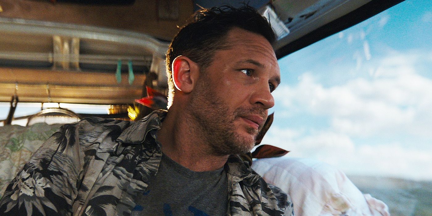 Tom Hardy sitting in a window seat in Venom The Last Dance