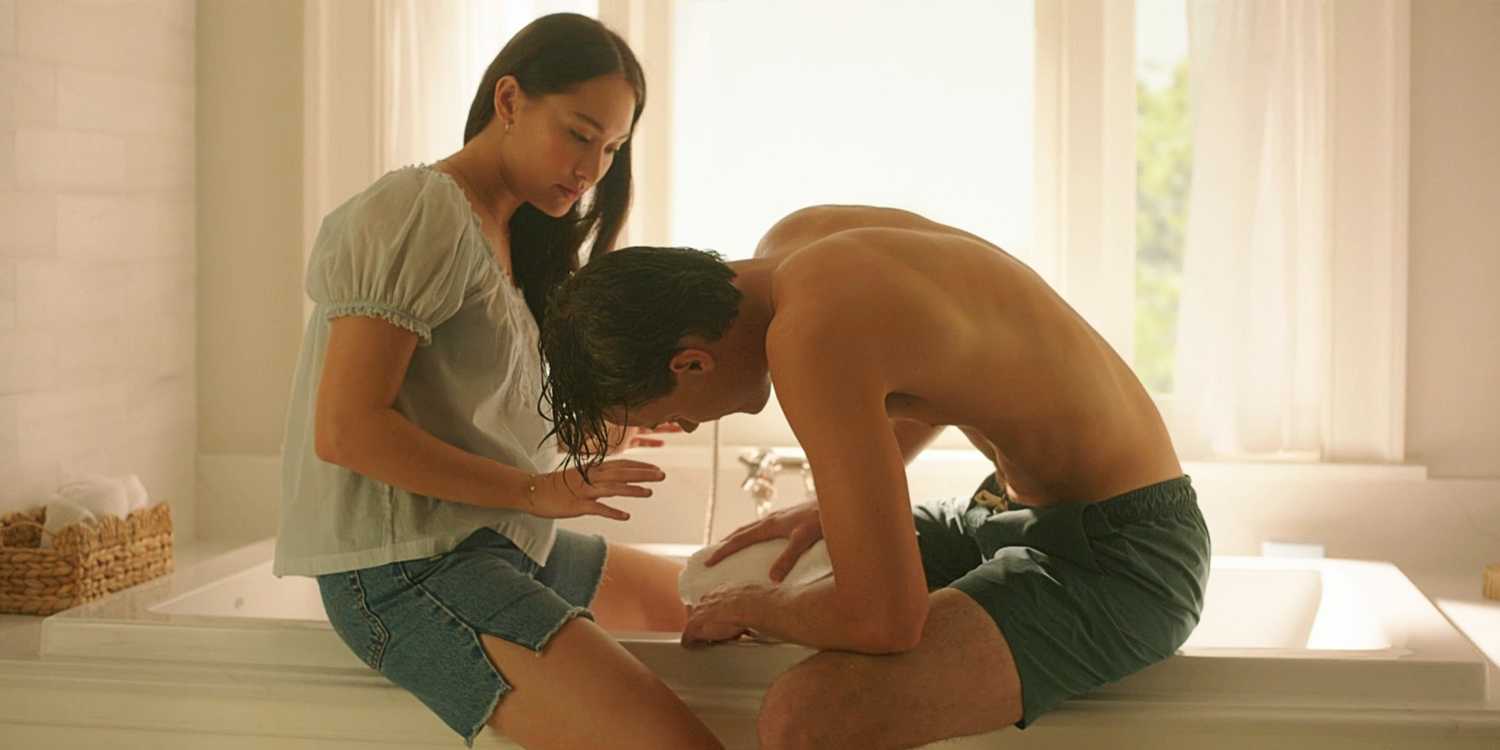 Belly Conklin helping Conrad Fisher clean out his wound in The Summer I Turned Pretty TSITP Season 3