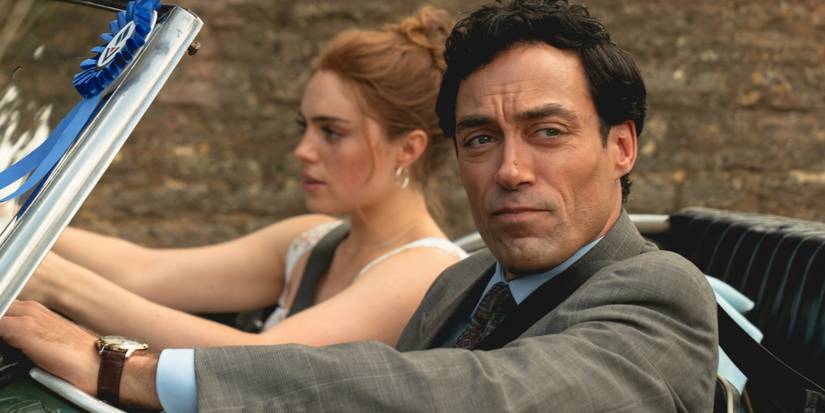 Rupert and Taggie driving in a car together in Rivals.