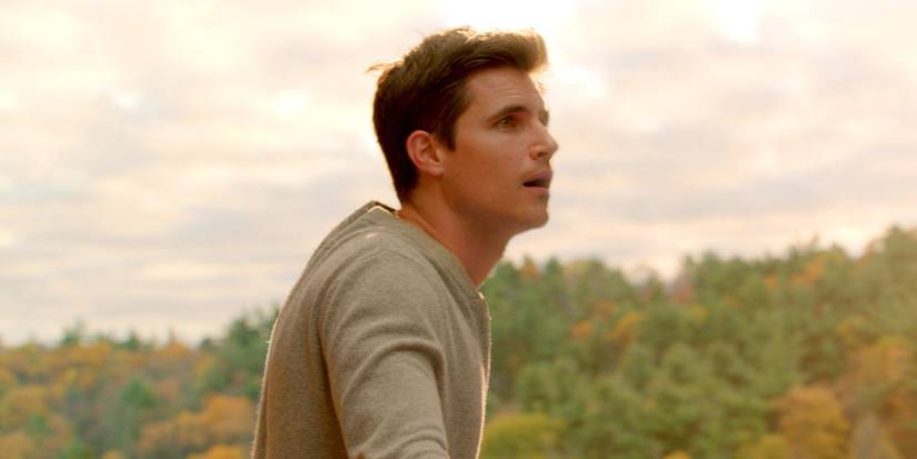 Robbie Amell looking out over nature in 'Upload'