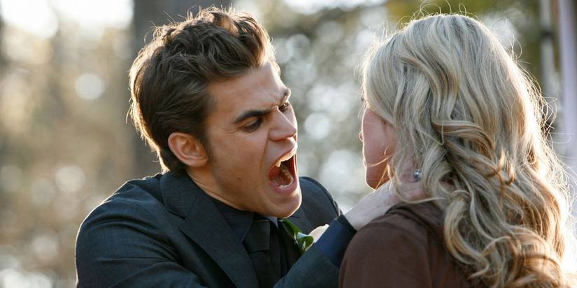 Stefan about to bite a girl