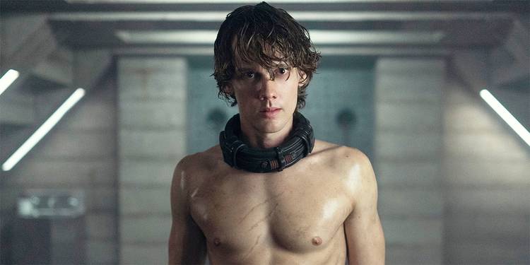 Hunter Doohan shirtless with a collar in 'Wednesday' Season 2.