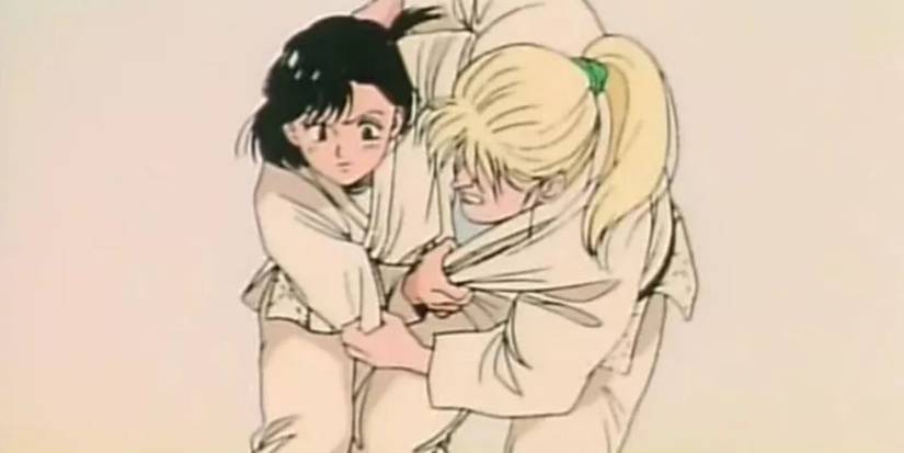 Girl throwing another girl in karate gi in Yawara.