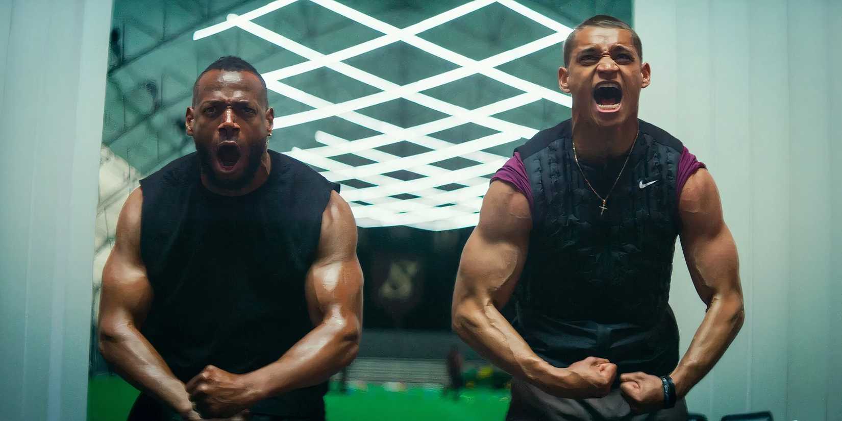 Marlon Wayans and Tyriq Withers in the 2025 film Him flexing while yelling.
