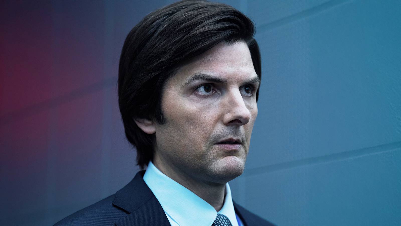 Adam Scott in a hallway in Severance