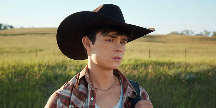 Cole Walter talking to Jackie Howard in 'My Life with the Walter Boys' Season 2.