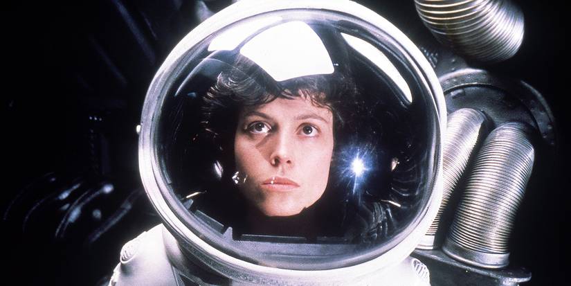 Sigourney Weaver in a space suit looking up in Alien.