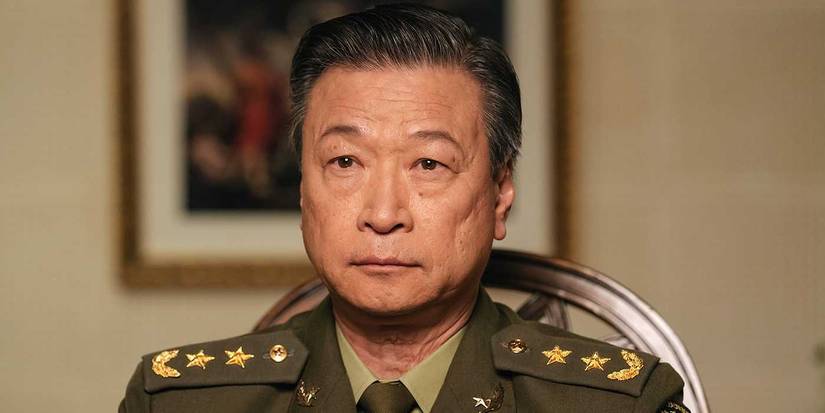Tzi Ma as General Shang in Arrival, wearing a decorated military uniform with a stern expression.