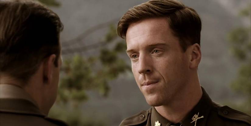 Damian Lewis as Major Richard "Dick" Winters talks to someone in Band of Brothers (2001).