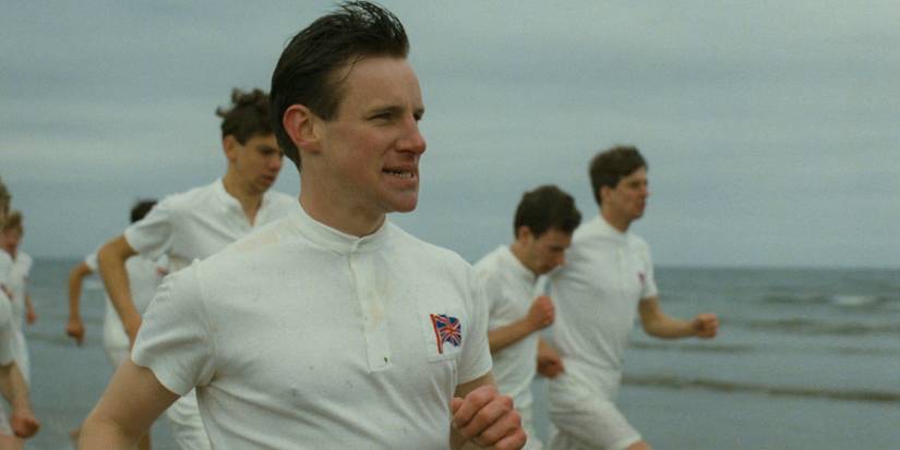 A group of men running along a beach in Chariots of Fire (1981)