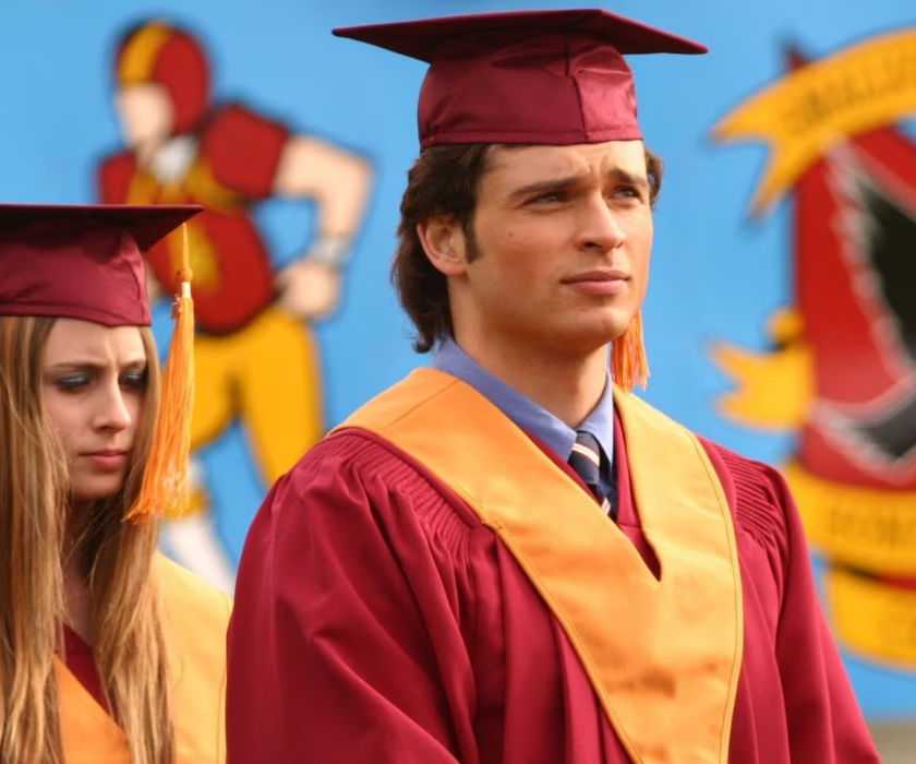 Tom Welling as Clark Kent wearing a cap and gown in Smallville episode Commencement.