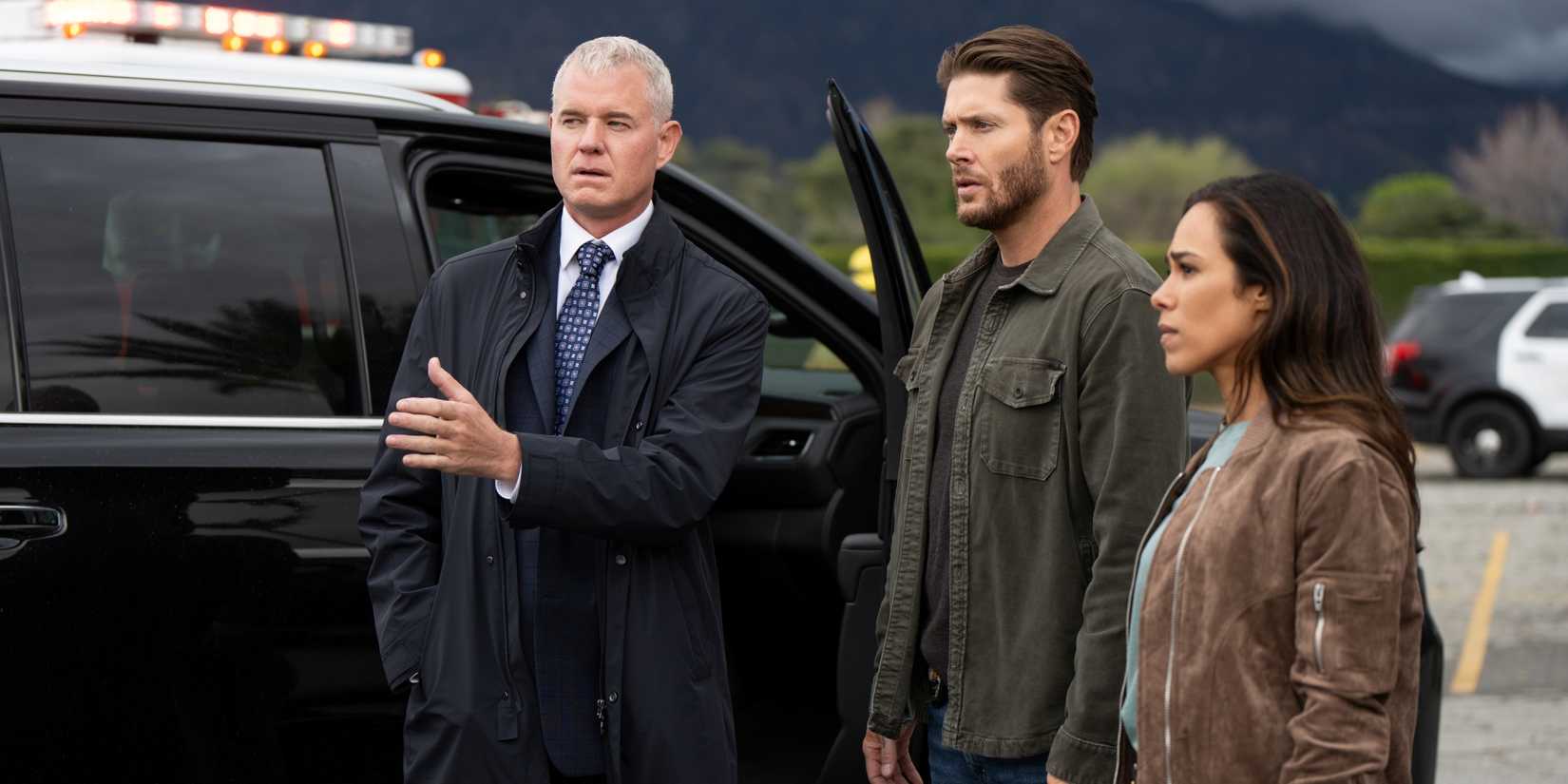 Eric Dane, Jensen Ackles and Jessica Camacho standing outside their car in Countdown