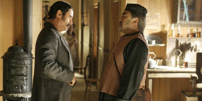 Ian McShane as Al Swearengen and Keone Young as Mr. Wu in the 'Deadwood' episode 'Mr. Wu.'