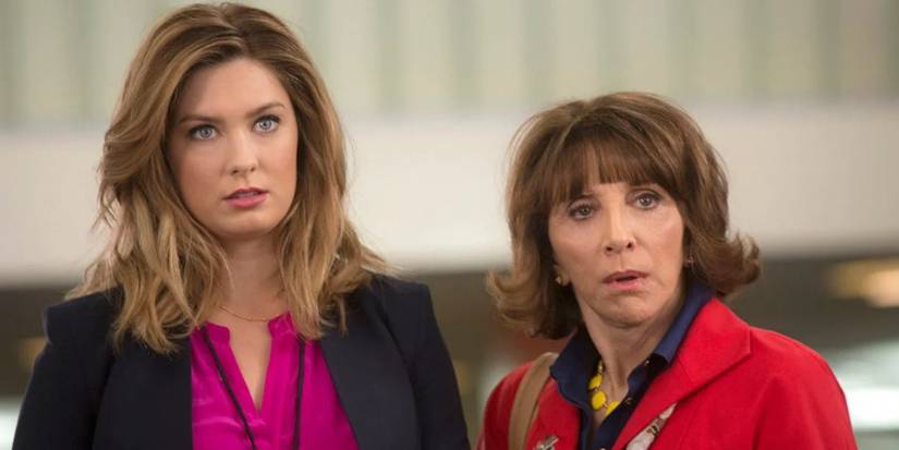 Katherine and Carol look at something unpleasant in Great News.