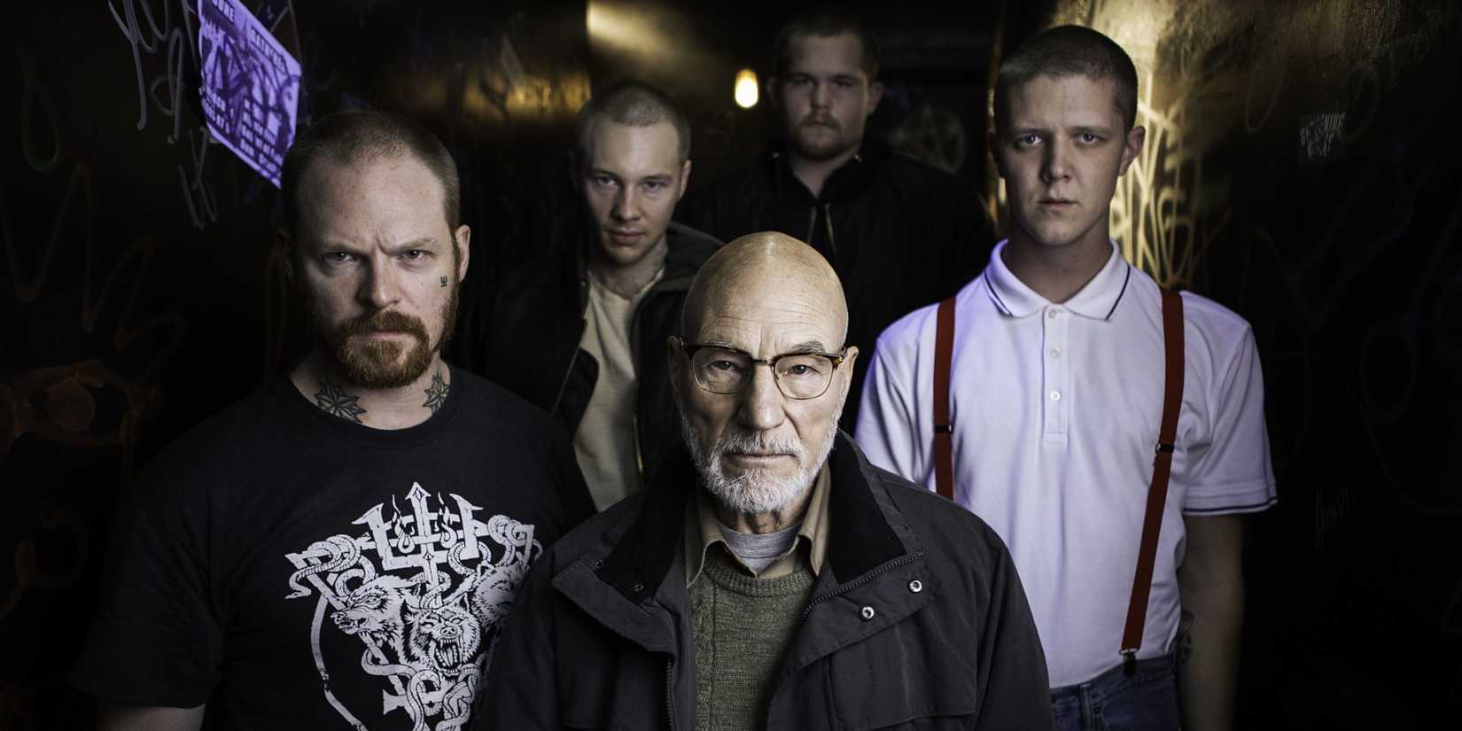 Patrick Stewart flanked by a group of neo-Nazis in Green Room