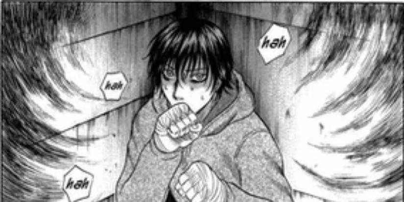 A man guarding himself while panting in the Holyland manga