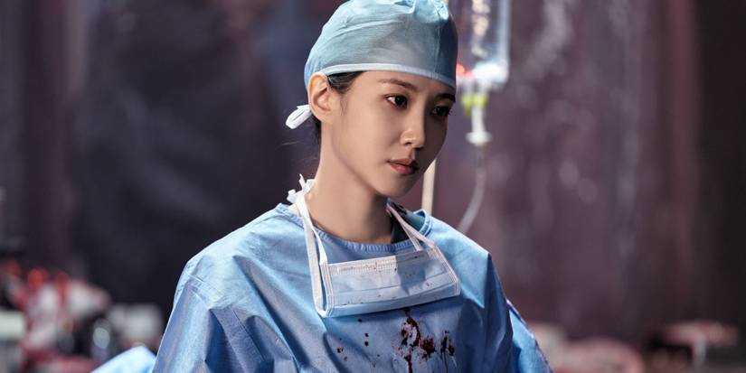 Park Eun-bin dressed in surgical scrubs and looking away in Hyper Knife
