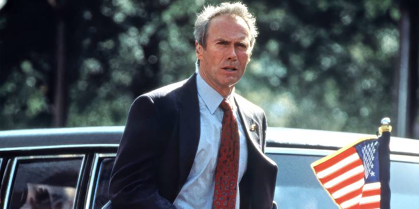 Clint Eastwood as Frank Horrigan running by Presidential limo in In the Line of Fire.