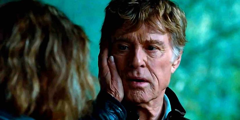 a woman puts her hand on Jim Grant's (Robert Redford) face lovingly in 'The Company You Keep'
