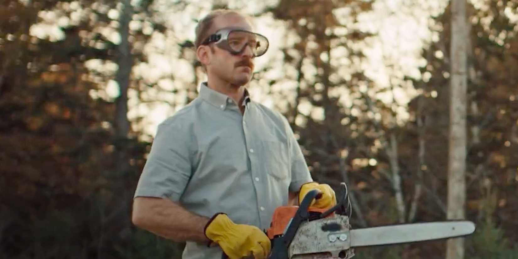Josh (Ben Foster) with a chainsaw in 'Sharp Corner'