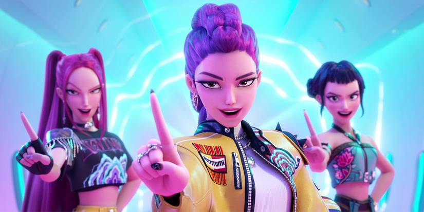 The pop group performing, each with a finger up in KPop Demon Hunters