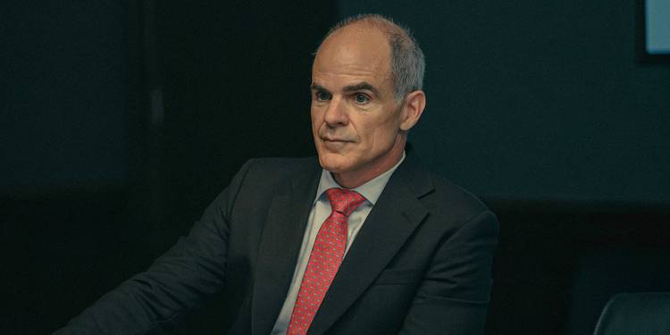 Michael Kelly as Byron Westfield wearing a suit in Lioness