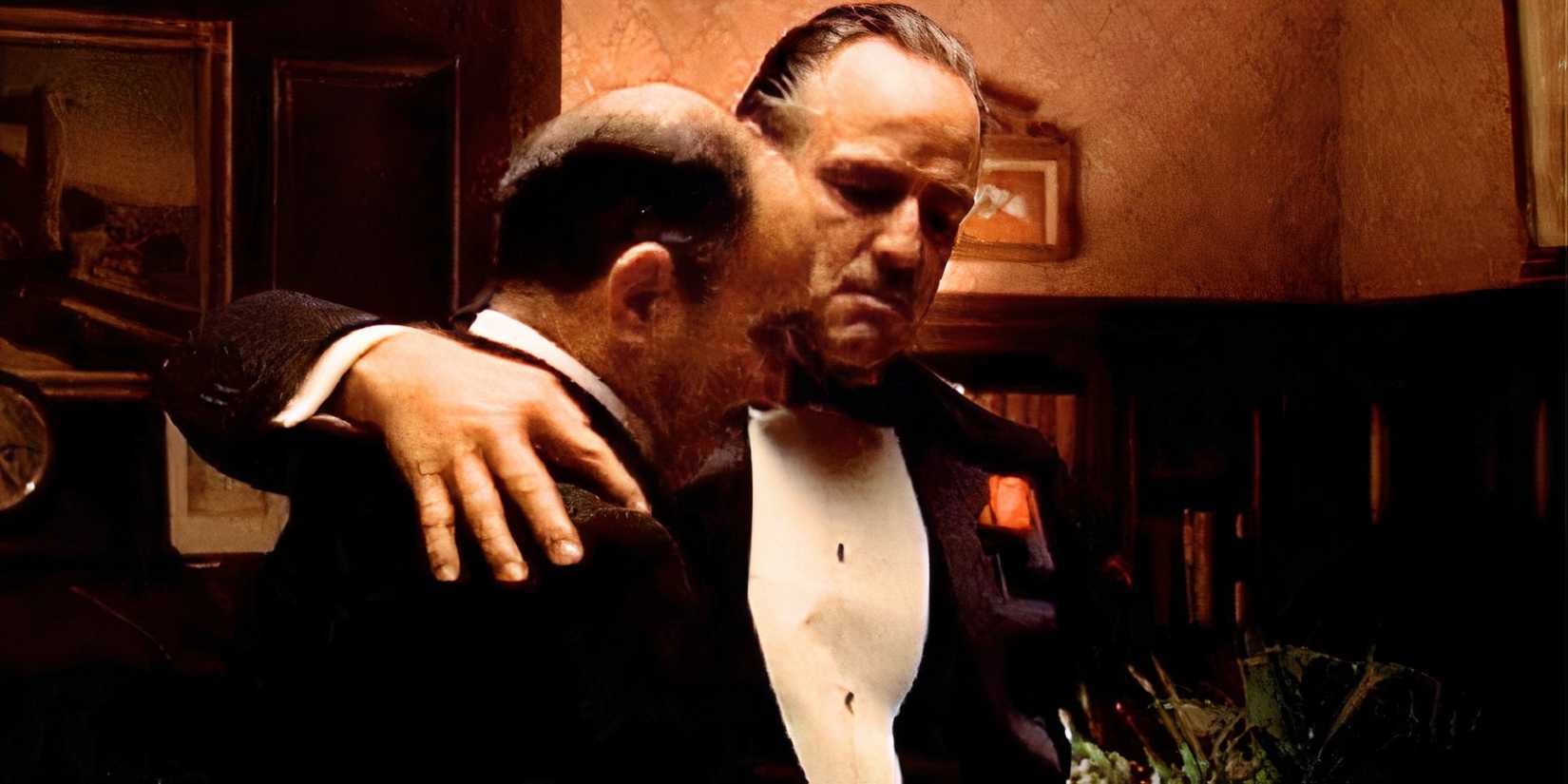 Marlon Brando with his arm around Salvatore Corsitto's shoulder in The Godfather (1972)