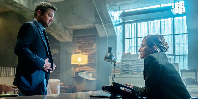 Jeremy Renner standing in front of Edie Falco's desk in Mayor of Kingstown Season 4.