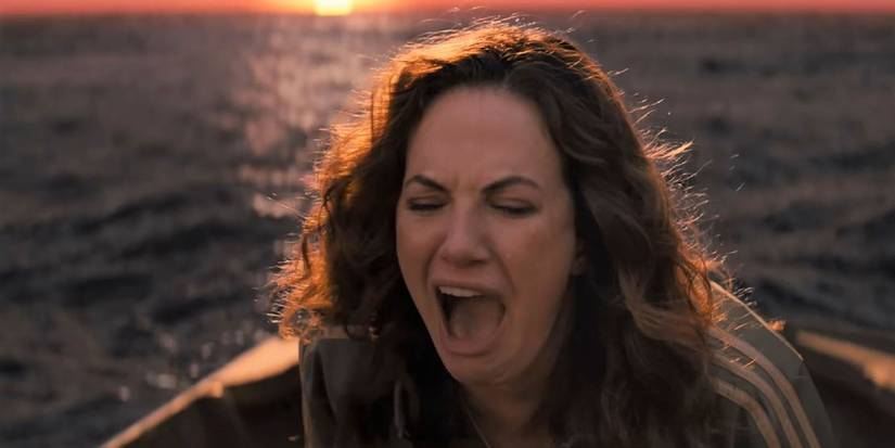 A woman in a boat in the water screaming in Midnight Mass.