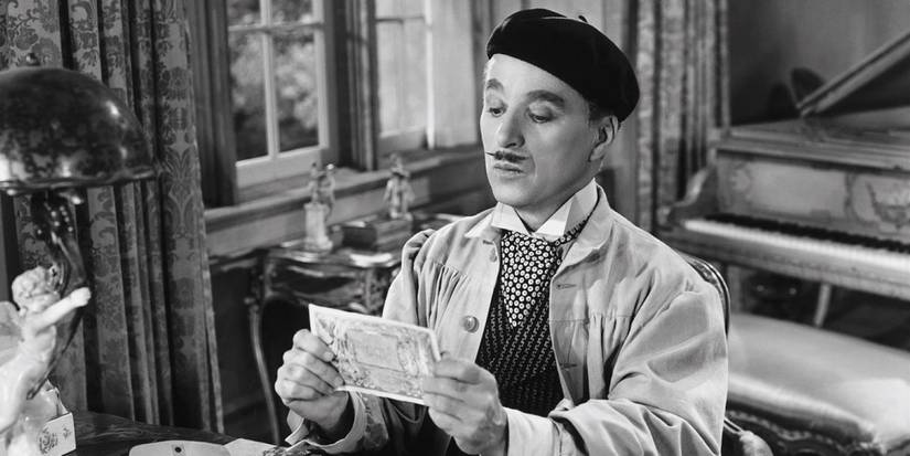 Monsieur Verdoux reading a postcard